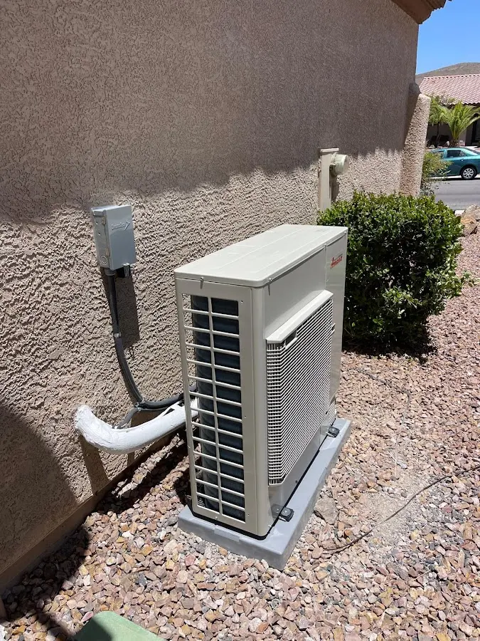 Residential air conditioning condenser unit in Williston